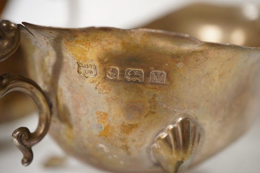 Sundry silver, consisting of - a pair of George V sauce boats, S. Blanckensee & Sons Ltd, Birmingham, 1936, a George III marrow scoop, Peter & Ann Bateman, London, 1793, a Victorian Scottish Kings pattern sauce ladle, te